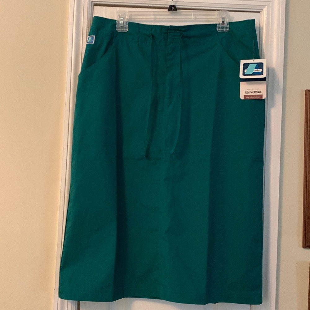 Hunter green skirt.